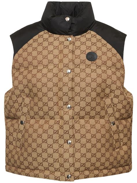 Veste doudoune sans manches GG en vert – Gucci .